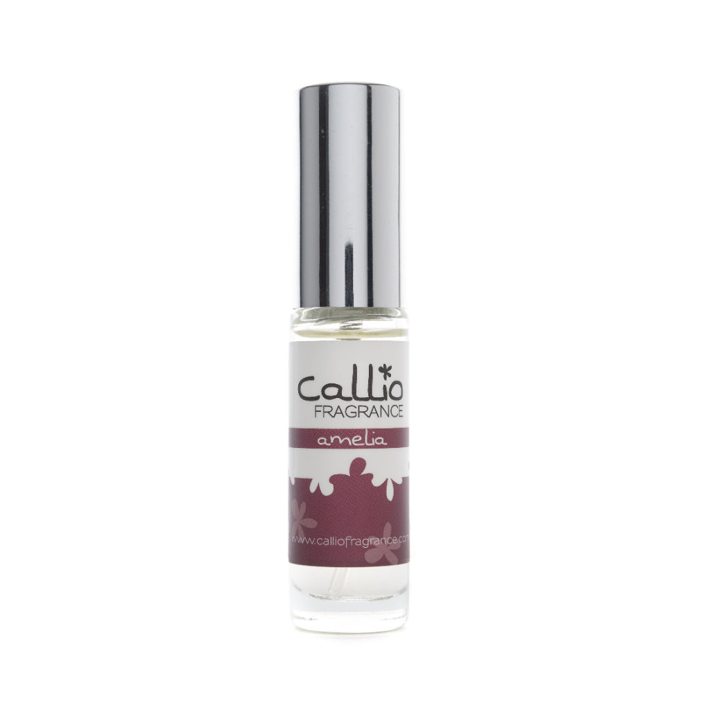 Image of a travel-size bottle of Amelia Perfume by Callio Fragranceon a bright white background. The perfume includes notes of blackberry, rose, and vanilla.