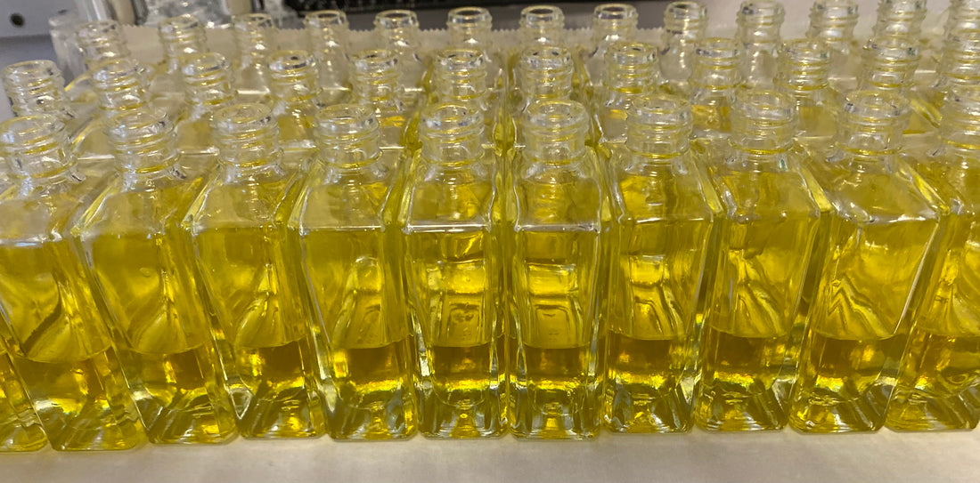 1 ounce bottles of fragrance that have just been filled; a behind the scenes look at Callio Fragrance.